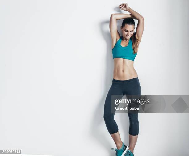Portrait of a fit and toned  woman wearing a sports bra
