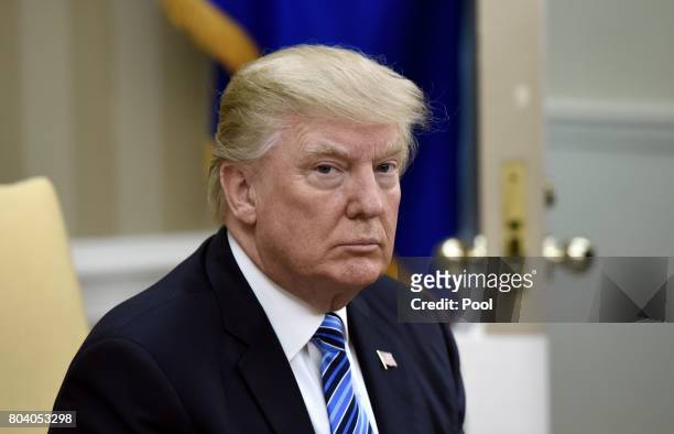 President Donald Trump looks on during a meeting with South Korean President Moon Jae-in in the Oval Office of the White House on June 30, 2017 in...