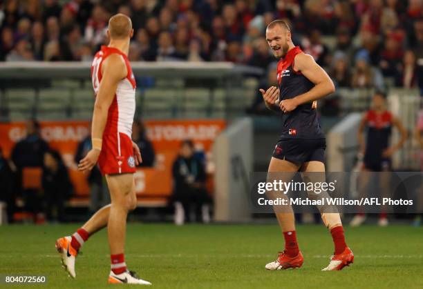 Max Gawn of the Demons and Sam Reid of the Swans exchange words during the 2017 AFL round 15 match between the Melbourne Demons and the Sydney Swans...