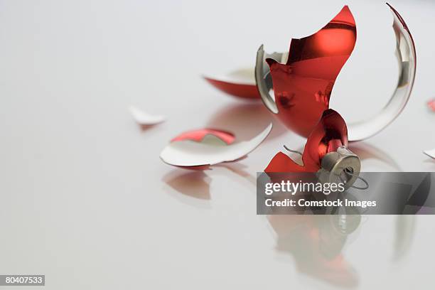 broken christmas ornament - broken christmas bauble stock pictures, royalty-free photos & images