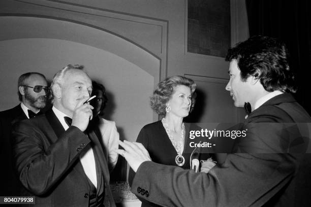 Prince Rainier III of Monaco and Princess Grace Of Monaco speaks with US musician Herb Alpert during a gala event organised by Grace Foundation on...