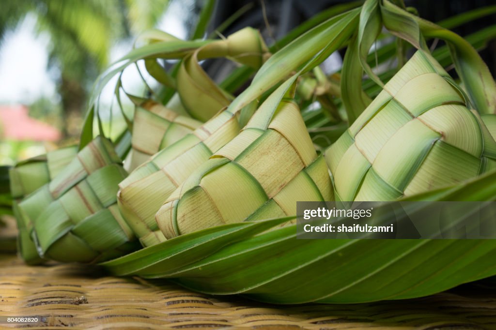 Ketupat, Kupat or Tipat is a type of dumpling made from rice packed inside a diamond-shaped container of woven palm leaf pouch. It is commonly found in Indonesia, Malaysia, Brunei and Singapore.