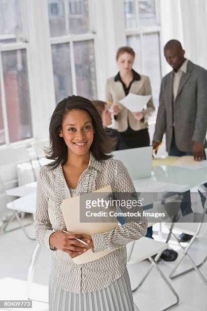 smiling businesswoman - incidental people stock pictures, royalty-free photos & images