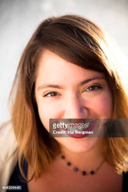 happy young woman in sunlight - mission district stock pictures, royalty-free photos & images