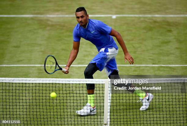 Nick Kyrgios of Australia plays a forehand during his match against Viktor Troicki of Serbia during day four of The Boodles Tennis Event at Stoke...