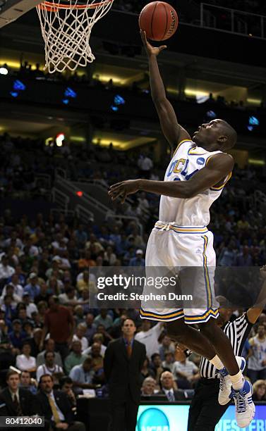 Darren Collison of the UCLA Bruins scores against the Western Kentucky Hilltoppers during the first half of the West Regional Sweet 16 game at the...