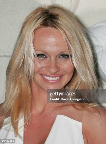 Actress Pamela Anderson attends the premiere of Dimension Films' 'Superhero Movie' at the Mann Festival Westwood on March 27, 2008 in Westwood,...