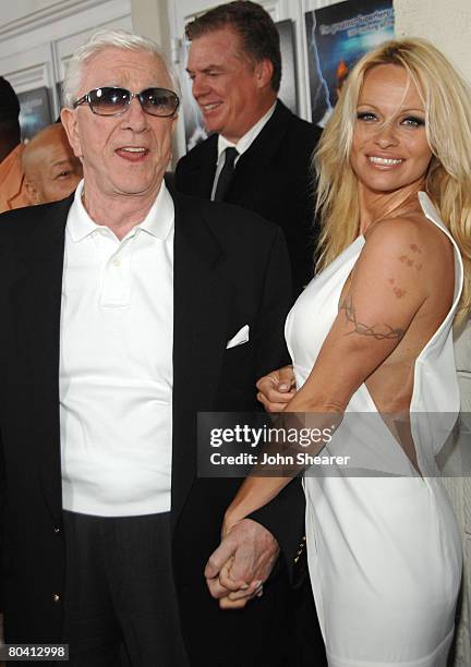 Actor Leslie Nielsen and actress Pamela Anderson arrive to the premiere of Weinstein Company's "Superhero Movie" at Mann Festival Theatre on March...