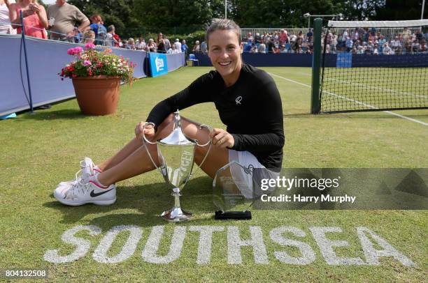 Tatjana Maria of Germany poses with the trophy after the Aegon Southsea Trophy final match between Irina-Cameliaon Begu of Romania and Tatjana Maria...