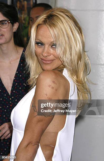 Actress Pamela Anderson arrives at the Premiere of Dimension Film's "Superhero Movie" on March 27, 2008 at the Mann Festival Westwood in Westwood,...