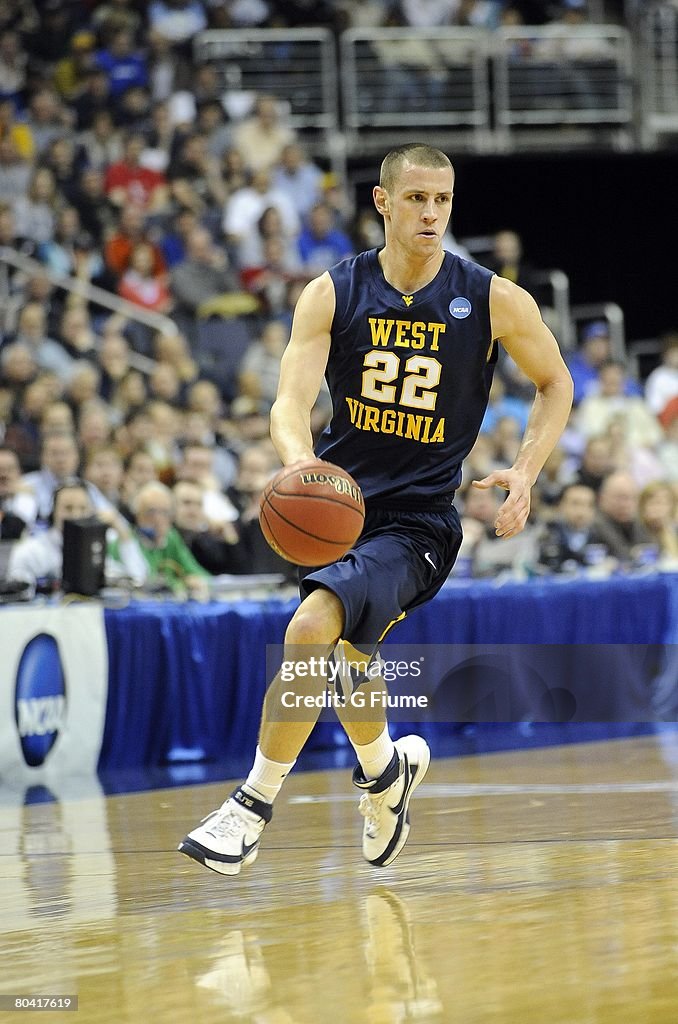 Alex Ruffa Alex Ruoff of the West Virginia Mountaineers brings the ball down the ...