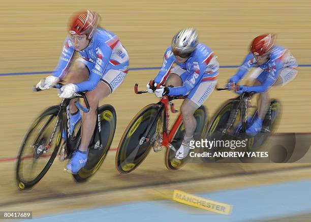 Russia's Evgeniya Romanyuta, Elena Chalykh and Anastasiya Chulkova compete during the women's team pursuit qualifying round in the UCI Track Cycling...