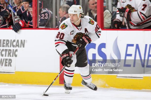 Robert Lang of the Chicago Blackhawks skates with the puck against the Columbus Blue Jackets on March 26, 2008 at Nationwide Arena in Columbus, Ohio.