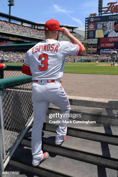 Danny Espinosa of the Los Angeles Angels of Anaheim walks up the dugout steps and onto the field during the game against the Detroit Tigers at...