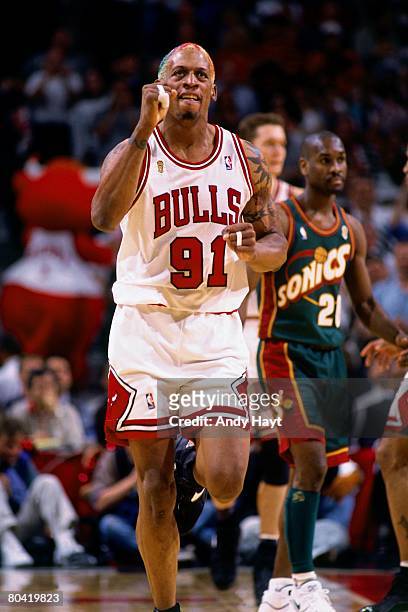 Dennis Rodman of the Chicago Bulls displays emotion in Game Six of the 1996 NBA Finals against the Seattle SuperSonics at the United Center on June...