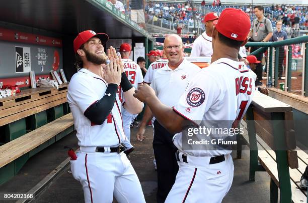 Bryce Harper and Joe Ross of the Washington Nationals talk before the game against the Chicago Cubs at Nationals Park on June 26, 2017 in Washington,...