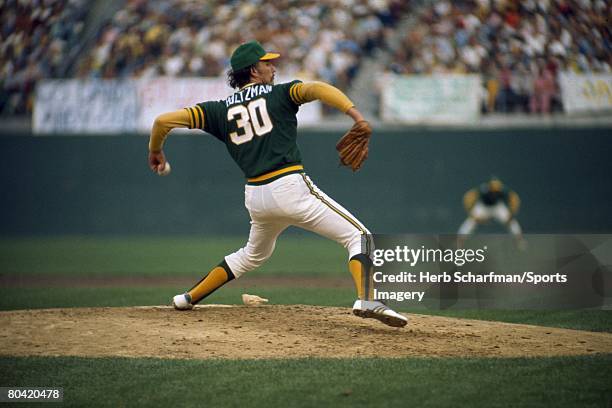 Ken Holtzman of the Oakland Athletics pitches during Game 4 of the 1974 World Series against the Los Angeles Dodgers on October 16, 1974 in Los...