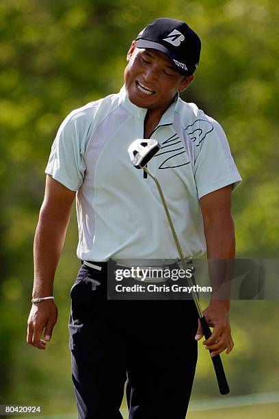 Shigeki Maruyama of Japan reacts to a missed putt for birdie on the 15th hole during the second round of the Zurich Classic of New Orleans at TPC...