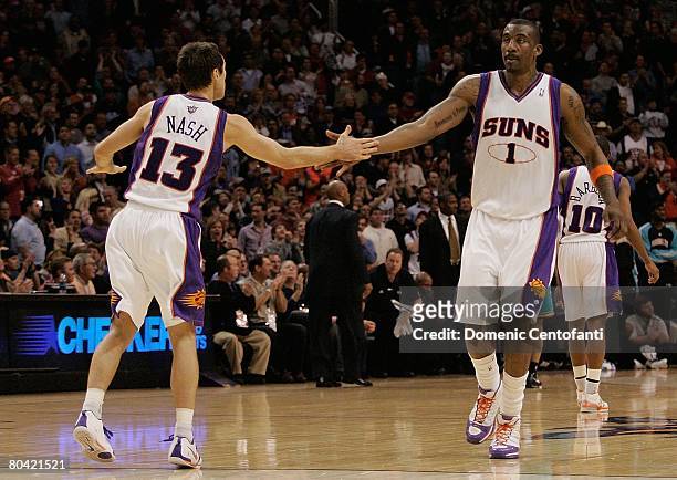 Steve Nash and Amare Stoudemire of the Phoenix Suns celebrate during the game against the New Orleans Hornets on February 6, 2008 at US Airways...