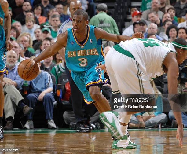 Chris Paul of the New Orleans Hornets drives up court against the Boston Celtics on March 28, 2008 at the TD Banknorth Garden in Boston,...