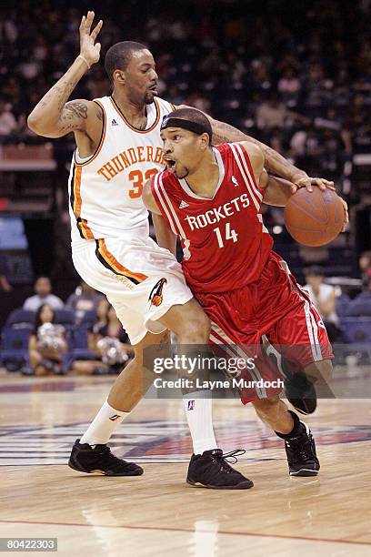 Desmon Farmer of the Rio Grande Valley Vipers drives the ball past Cory Underwood of the Albuquerque Thunderbirds in an NBA D-Leaque game at the...