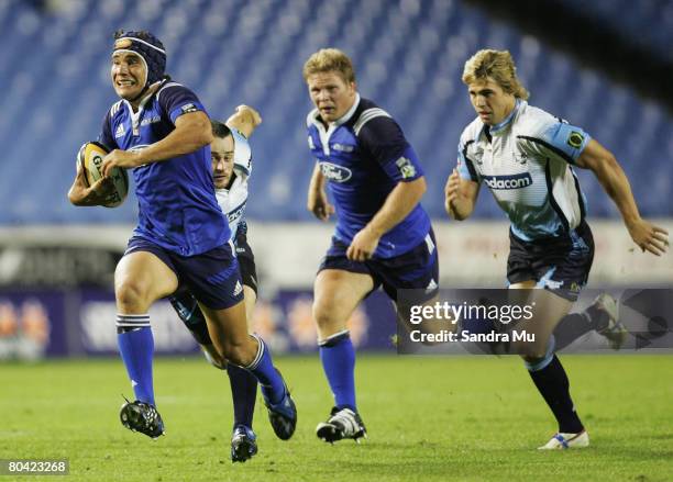 Benson Stanley of the Blues in action with Daniel Braid of the Blues in support during the round seven Super 14 match between the Blues and the Bulls...