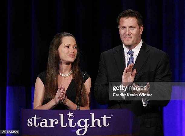 Event Co-Chairs Kevin Mayer, Exec. V.P., Walt Disney Company, and his wife Lisa appear onstage at the Starlight Starbright Children's Foundation's "A...