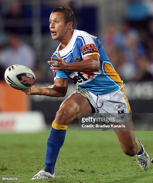 Scott Prince of the Titans passes the ball during the round three NRL match between the Gold Coast Titans and the Cronulla Sharks at Skilled Stadium...