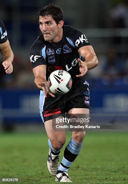Isaac De Gois of the Sharks passes the ball during the round three NRL match between the Gold Coast Titans and the Cronulla Sharks at Skilled Stadium...