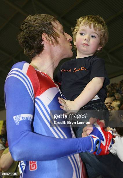 Bradley Wiggins of Great Britain kisses his son Ben following his victory in the Men's Madison Final during the UCI Track Cycling World Championships...