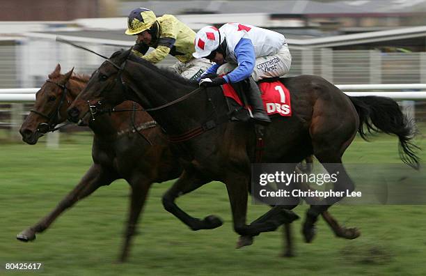 Timmy Murphy riding Diamond Harry beats Gerard Tumelty riding Shalone to win The DBS Spring Sales Bumper at Newbury Racecourse on March 29, 2008 in...