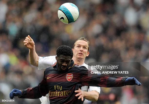 Bolton Wanderers' English forward Kevin Davies vies with Arsenal's Ivory Coast defender Kolo Toure during the English Premier league football match...