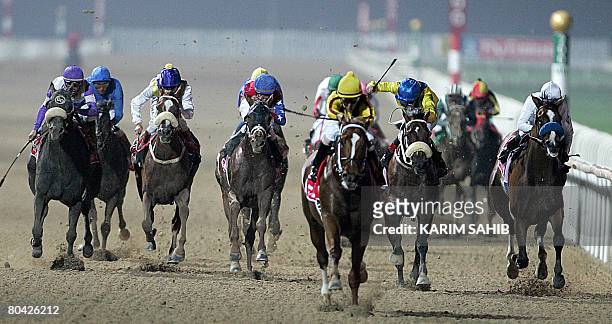 Jockey Robby Albarado rides US born horse Curlin to victory in the six million dollar Dubai World horse race during the Dubai World Cup at Nad...