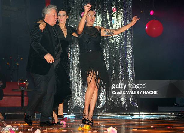 Spanish director Pedro Almodovar and Spanish actress Rossy de Palma dance during the annual Rose Ball "Movida" at the Monte-Carlo Sporting Club in...