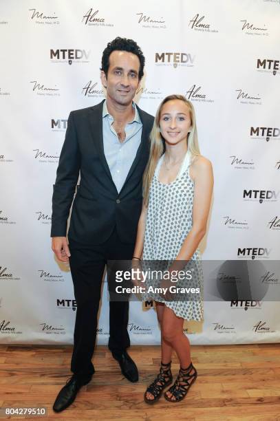 Dr. Marc Mani and his daughter Erica attend A Night Out, a fundraising event benefiting #MoveToEndDV hosted by Beverly Hills plastic surgeon Dr. Marc...