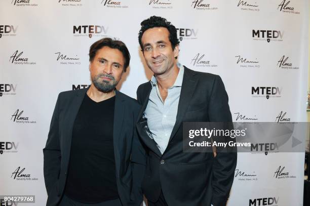 Dr. Marc Mani and Alex Casalino attend A Night Out, a fundraising event benefiting #MoveToEndDV hosted by Beverly Hills plastic surgeon Dr. Marc Mani...