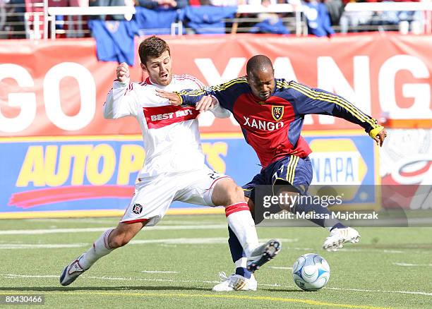 Andy Williams of the Real Salt Lake goes for the ball against Gonzalo Segares of the Chicago Fire at Rice-Eccles Stadium March 29, 2008 in Salt Lake...