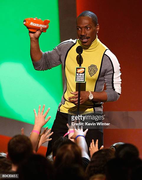 Actor Eddie Murphy accepts the Favorite Voice from an Animated Movie award for Donkey in "Shrek the Third" during Nickelodeon's 2008 Kids' Choice...