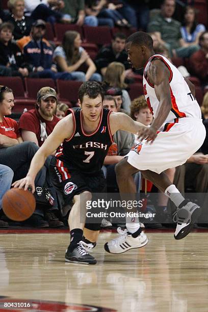 Kevin Kruger of the Utah Flash drives past Mike Taylor of the Idaho Stampede during the D-League game on March 29, 2008 at Qwest Arena in Boise,...