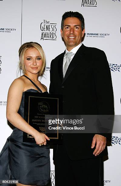 Actress Hayden Panettiere holds her award while posing with Wayne Pacelle , President of the Humane Society of the United States at the 22nd Annual...