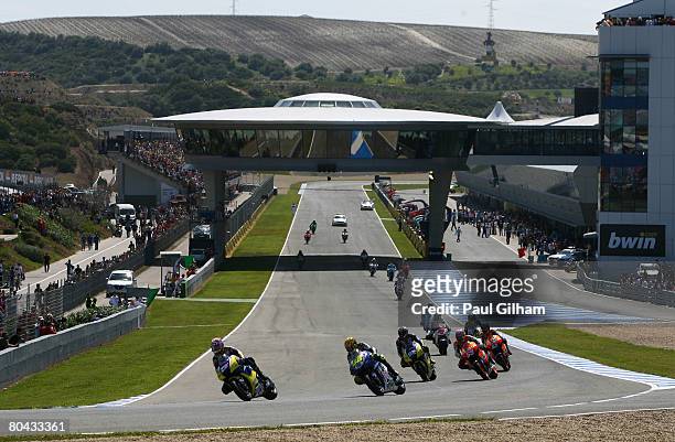 General view of riders in action on the parade lap prior to the start of the MotoGP of Spain at Circuito de Jerez on March 30, 2008 in Jerez, Spain.