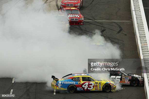 Bobby Labonte, driver of the Cheerios/Betty Crocker Dodge, Scott Riggs, driver of the State Water Heaters Chevrolet, and Jeff Gordon, driver of the...