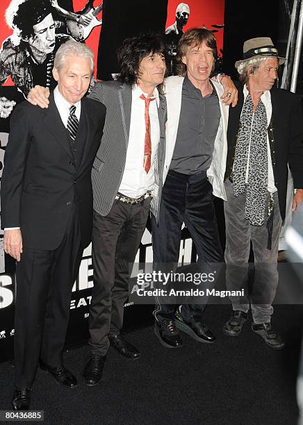 Musicians Charlie Watts, Ronnie Wood, Mick Jagger and Keith Richards of the Rolling Stones arrive at the premiere of 'Shine A Light' at the Ziegfeld...