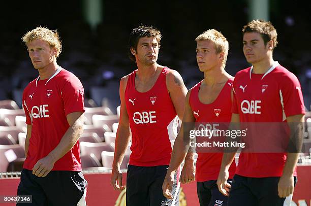 Craig Bolton, Brett Kirk, Chris Jack and Craig Bird walk during a Sydney Swans AFL recovery session held at the Sydney Cricket Ground on March 31,...