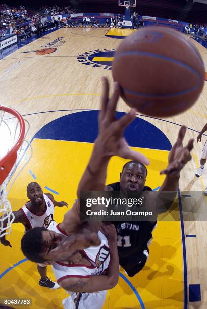 Yemi Nicholson of the Austin Toros goes to the basket against Patrick O'Bryant of the Bakersfield Jam on March 30, 2008 at Rabobank Arena in...
