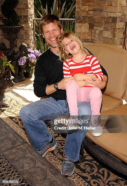 Joel Gretsch having some fun with his daughter Kaya Gretsch at the art opening of Giorgio Tuscani and Elizabeth Shatner on March 29, 2008 at a...