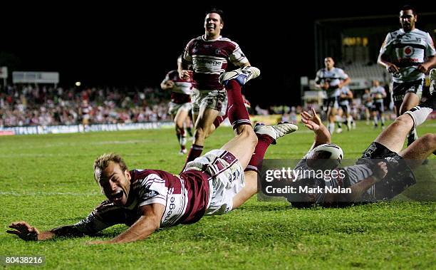 Brett Stewart of the Eagles scores a try during the round three NRL match between the Manly Warringah Sea Eagles and the Warriors at Brookvale Oval...