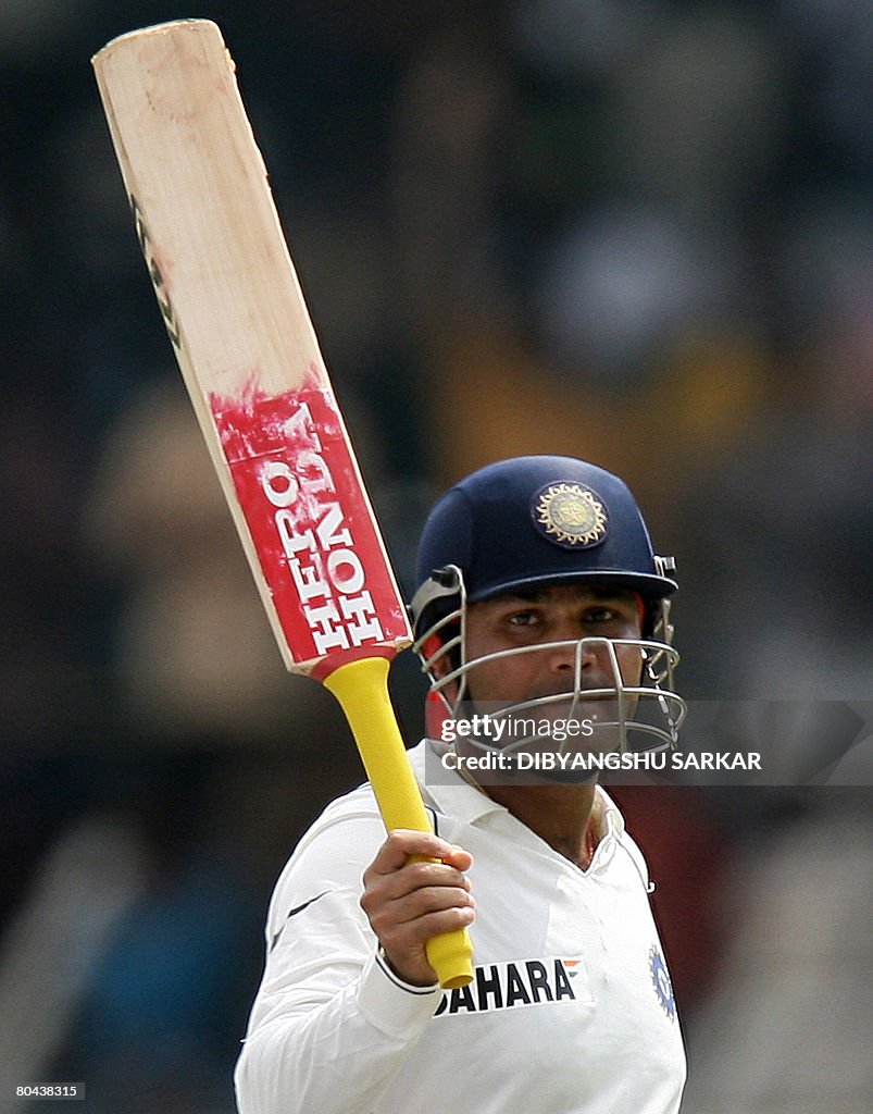 Indian cricketer Virender Sehwag acknowl