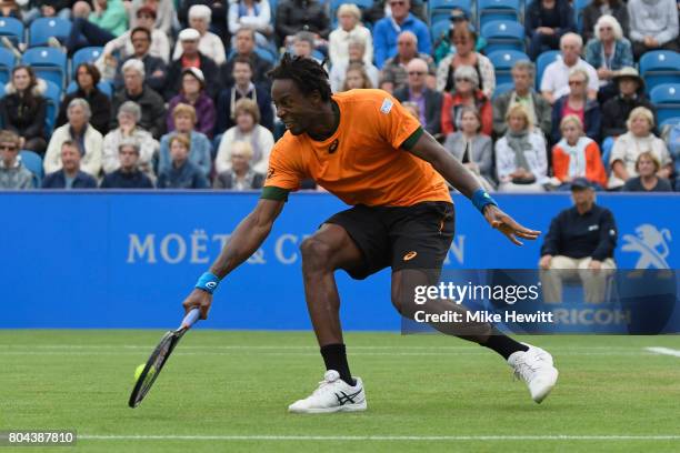 Gael Monfils of France in action against Richard Gasquet of France during Day 6 of the Aegon International Eastbourne tournament at Devonshire Park...