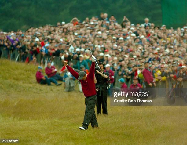 British golfer Justin Rose celebrates after chipping in from the 18th fairway to finish his final round during the British Open Golf Championship...